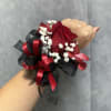 Large red rose with red alstroemerias and  white accents,  and