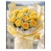 Yellow rose bouquet wrapped in cream and pale yellow paper