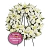 White funeral wreath on a standing easel