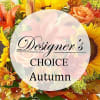 Autumn flower arrangement with sunflowers, roses, and orange lilies