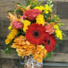 Bright, energetic color greets them at first glance-the perfect birthday bouquet or