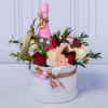 Box of Assorted Flowers like Roses and Carnations with Accents of Eucalyptus.