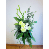 Tall floral standing arrangement with white and pale green blooms