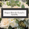 Soft cream and blush roses take center stage in this sympathy flower