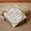 Stacked handmade soap bars with citrus labels