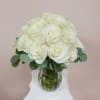 This 24 white Mondial rose bouquet says it all when sending your