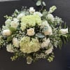 White and pale green floral spray with roses and hydrangeas