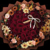 Heart-shaped bouquet of red roses with peach and yellow flowers