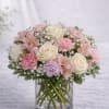  Description: A graceful and romantic arrangement featuring creamy white roses, soft