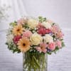 Golden Blush Garden is a soft and elegant arrangement designed in warm