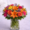 A bold and radiant arrangement inspired by the warmth of a glowing