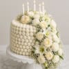 A breathtaking all-white floral cake designed to embody elegance and softness. Heavenly