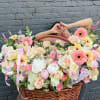 Large pastel flower basket with pink and white blooms