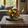 This stunning cornucopia centerpiece is a beautiful representation of the fall season