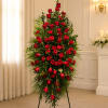 A cascade of vivid red roses forms the centerpiece of this red