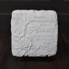 Decorative memorial plaque with roses and a sympathy quote