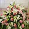 Large pink and white floral spray with lilies and roses
