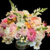 Pastel mixed flower bouquet in a glass vase