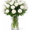Bouquet of white roses in a clear glass vase