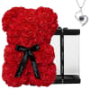 Red rose teddy bear with a black ribbon and heart necklace gift box