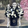 Beauty&rsquo;s back and white arrangement in our signature black velvet box, with
