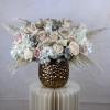 This stunning vase arrangement features a lush combination of elegant roses and