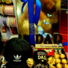 A thoughtful gift set featuring an Adidas cap, a "Recently Promoted to