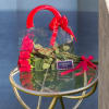 A small bundle of long-stem red roses arranged for a modern romantic