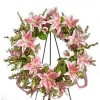 Pink lily wreath on a black easel