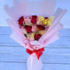 Pink and red rose bouquet with butterfly picks and a red ribbon
