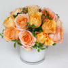 The orange color and the salmon color rose give a feeling of