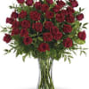 Bouquet of red roses in a clear glass vase