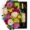 A pastel floral arrangement in a wood box paired with Florentia Chianti