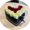 A compact heart-shaped arrangement of roses designed to make the person you're