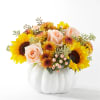 Sunflower and peach rose arrangement in a white pumpkin vase