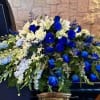 Flowing across like a comforting blanket, this tribute symbolizes the many memories