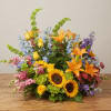 Mixed bouquet with sunflowers, orange lilies, and colorful blooms