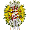 Large standing floral wreath with red, white, and yellow flowers on ribbons