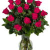A lush cluster of hot pink roses creates an immediate romantic impression-perfect