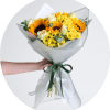 Bright, sunny sunflowers take center stage in this cheerful bouquet-perfect as a