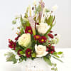 Beautiful white and burgundy Fall mix in a white pumpkin vase. To