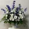 This Arrangement Includes Blue Delphinium, White Snapdragons, Blue Thistle and White Daisies