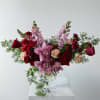 Imagine a bouquet that&rsquo;s a total heart-stealer: red roses, dusty pink carnations