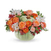 Teleflora's Whimsy Pumpkin Bouquet offers a stylish option for your autumn table.