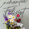 A cheerful, garden-style centerpiece that makes someone feel truly celebrated-our Spring Favorites
