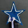 Large blue and white star-shaped floral tribute with a ribbon bow