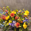 Honor a loved one with a half or full casket spray. Created