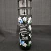 Black memorial lantern with floral and butterfly print and a remembrance message