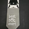 Gray dog bandana on retail packaging with "best. DOG. ever!" text