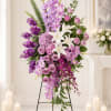 This purple Wreath is often associated with reverence, peace, and eternal rest.